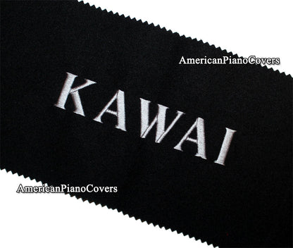 black felt Kawai piano key cover with silver logo